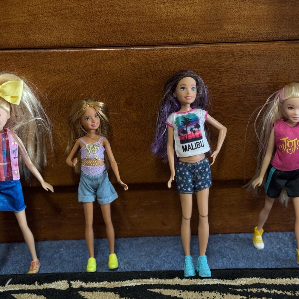 Disney Doll Set two JoJo dolls and 2 unknown do Purple, Blonde, and Blue Accents